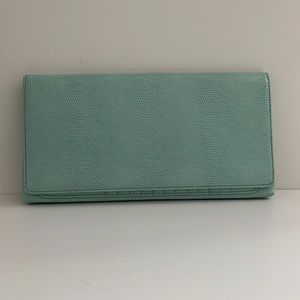 Light green textured clutch